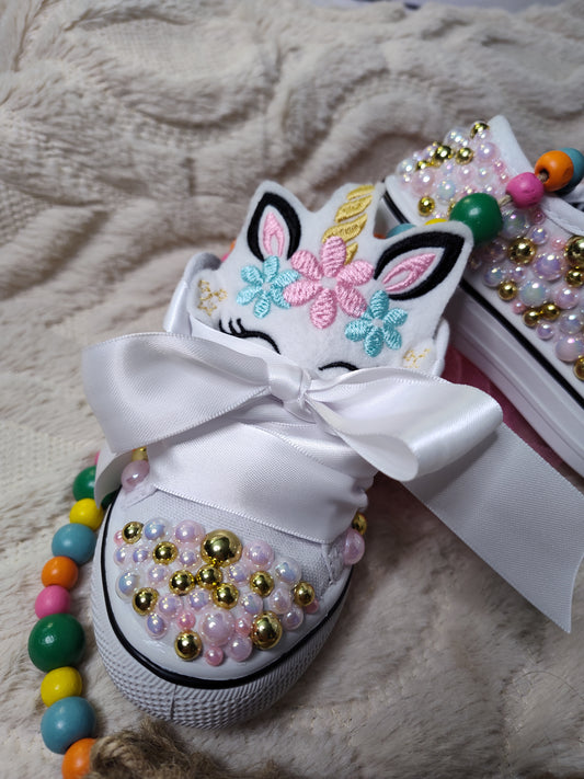 "Unicorn Magic: Sparkling Flatback Pearls Transform these Bling Shoes into Enchanting Footwear!"